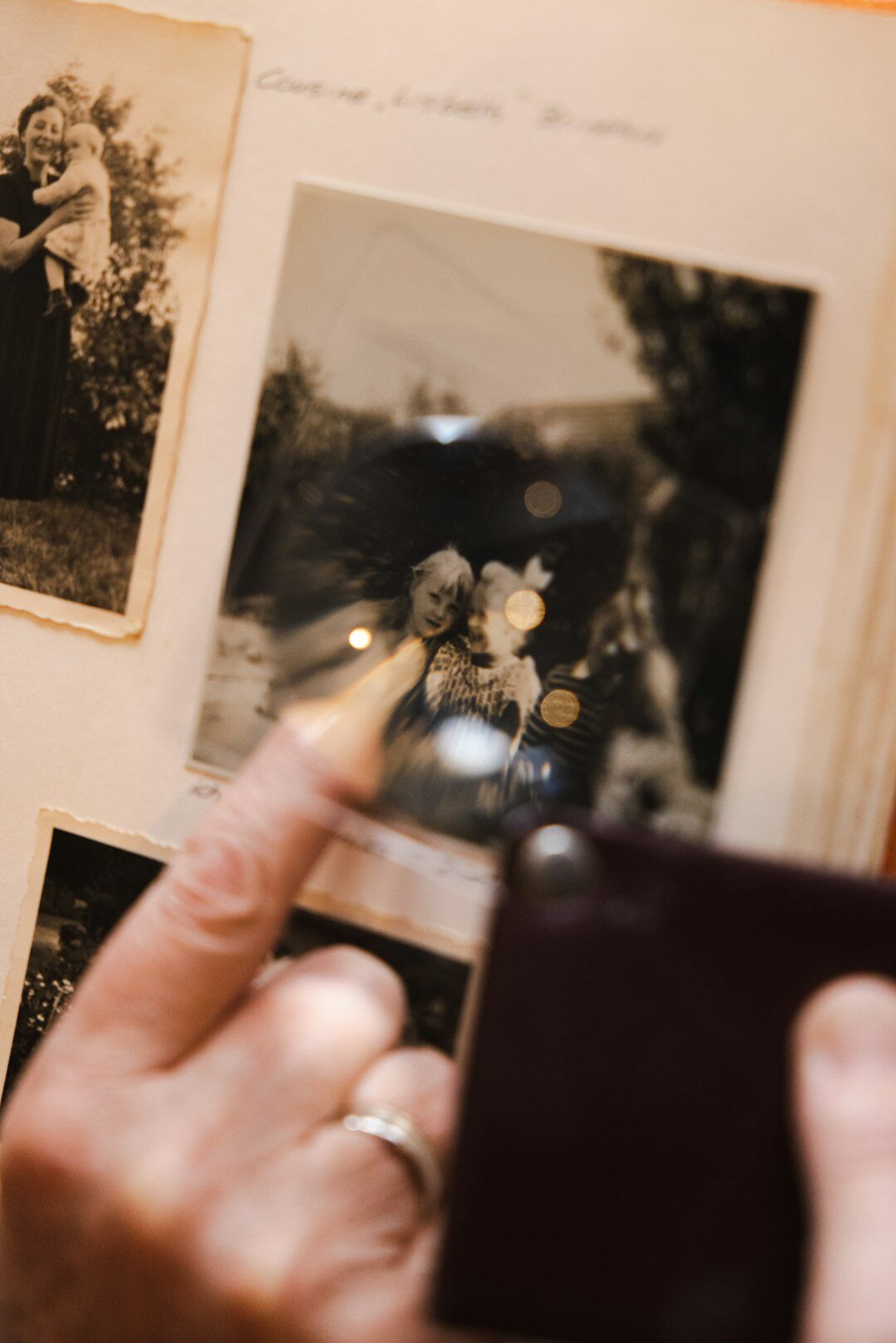 elderly person looking at old photos