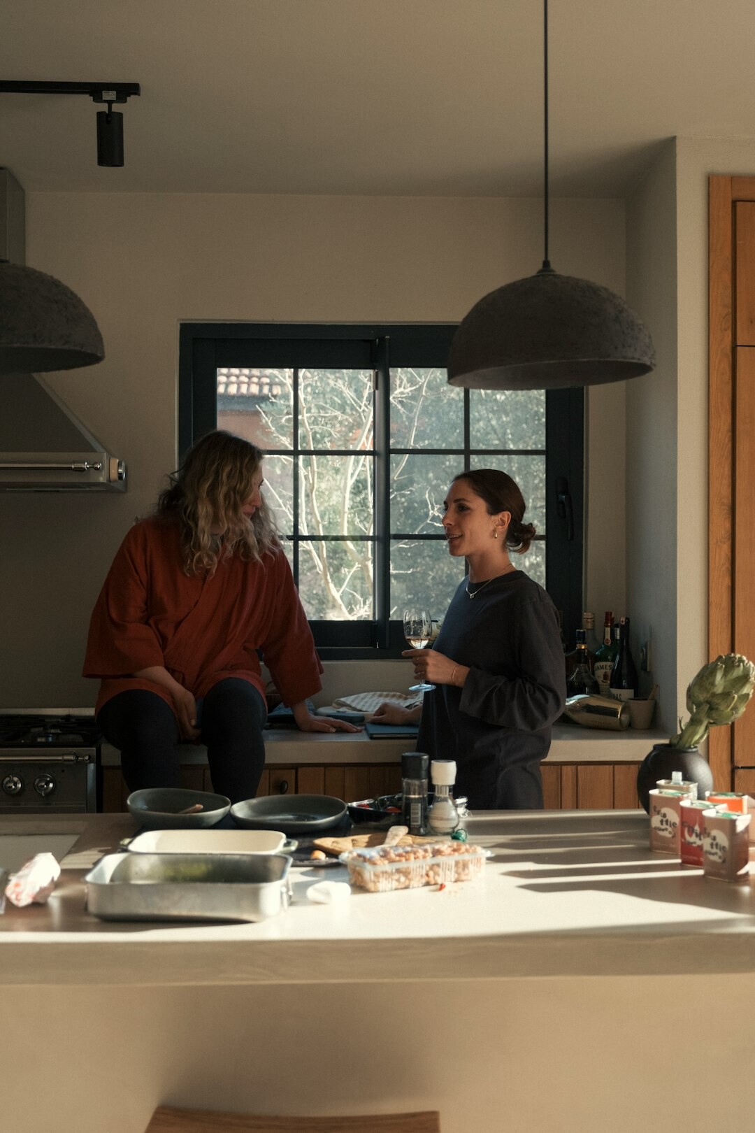 man sharing story in kitchen