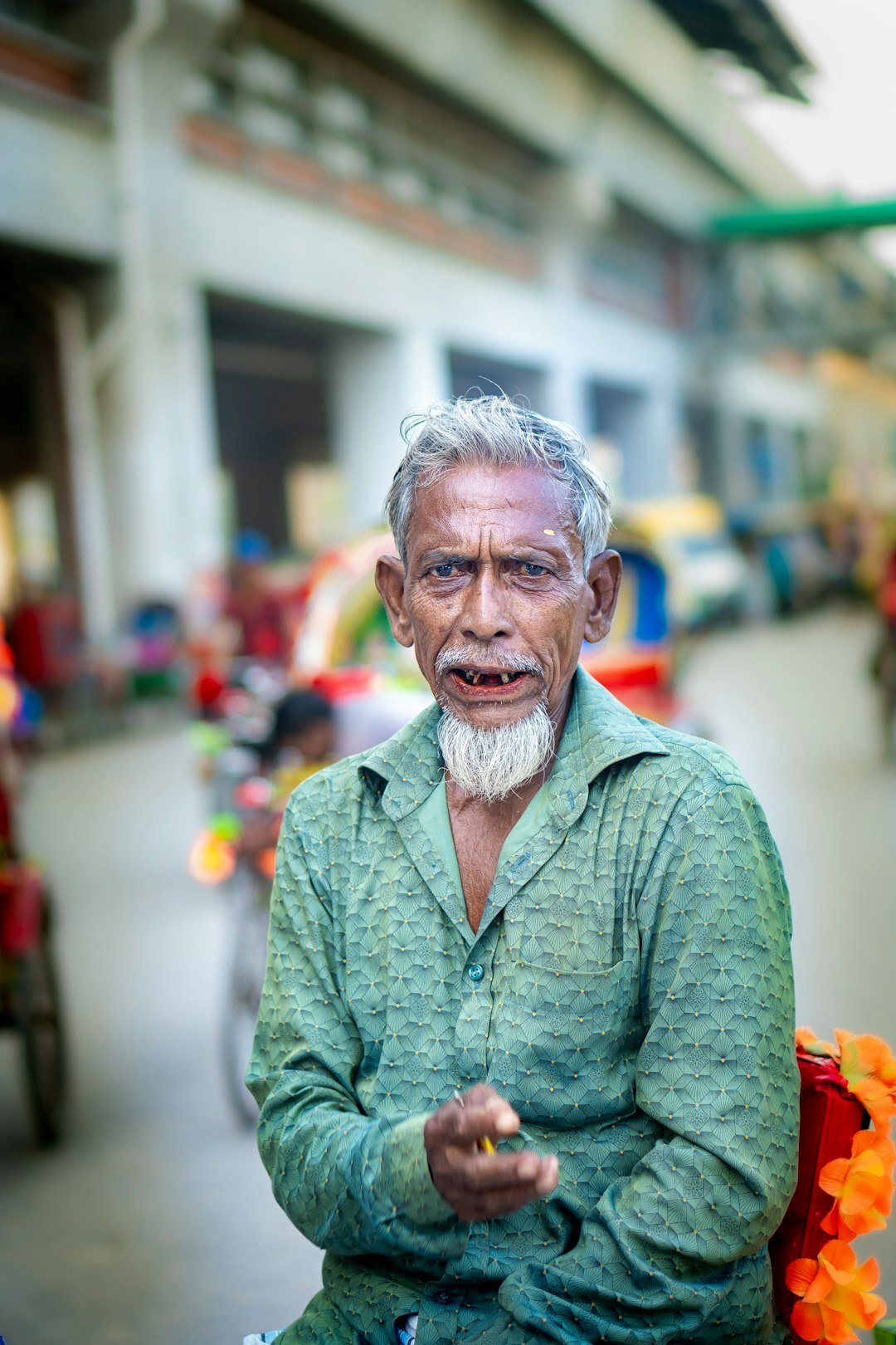 senior man gesturing while talking